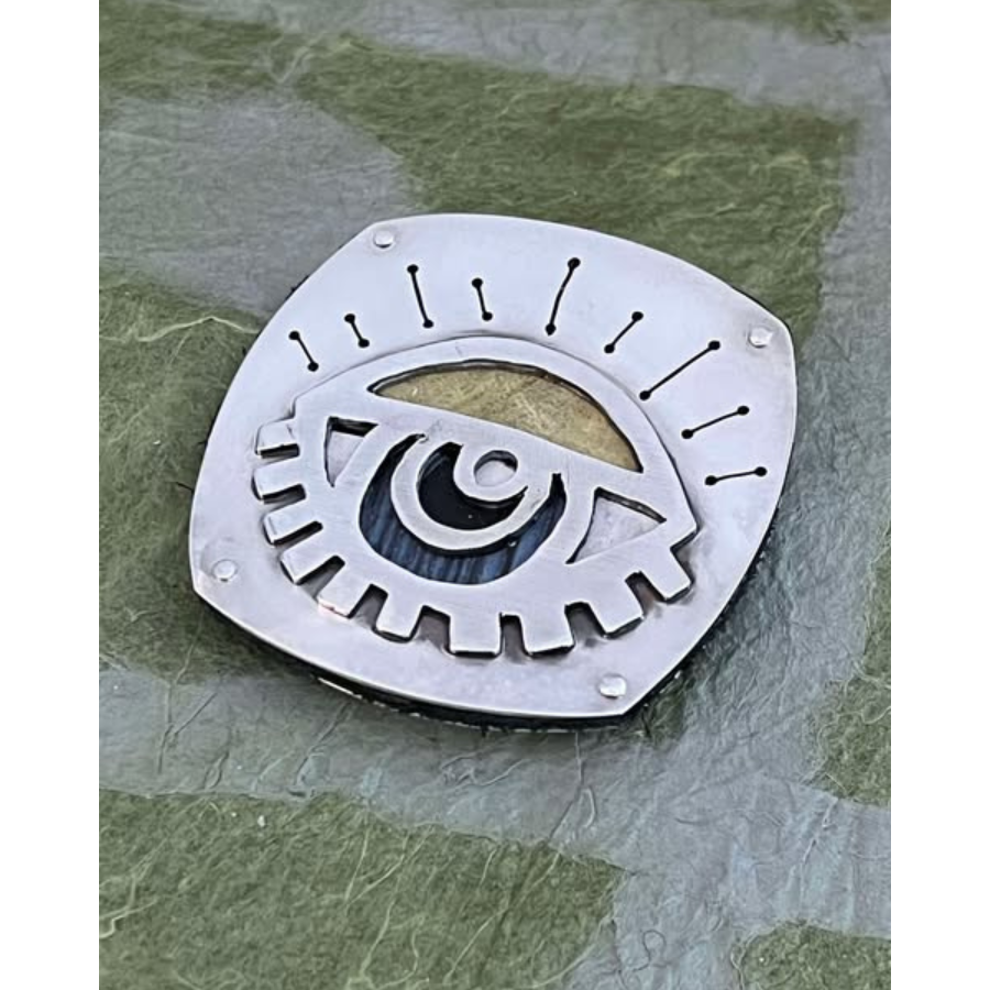 Metal graphic eye sculpture