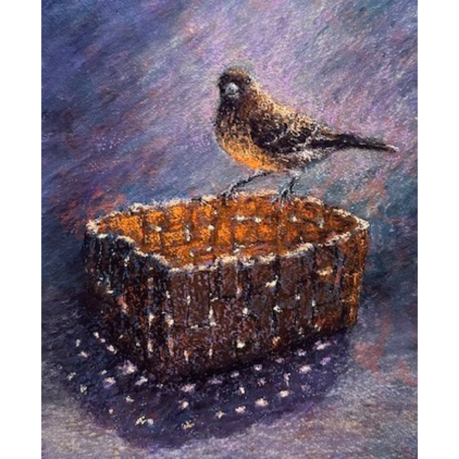 Pastel bird sitting on a basket